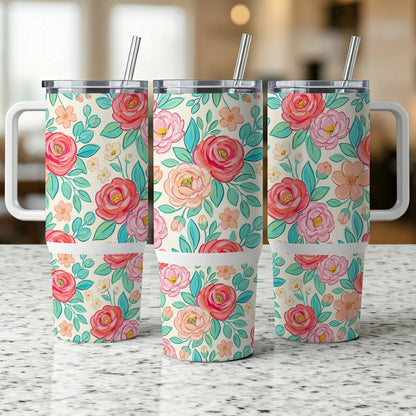 Three tumblers with a floral pattern featuring pink roses and green leaves.