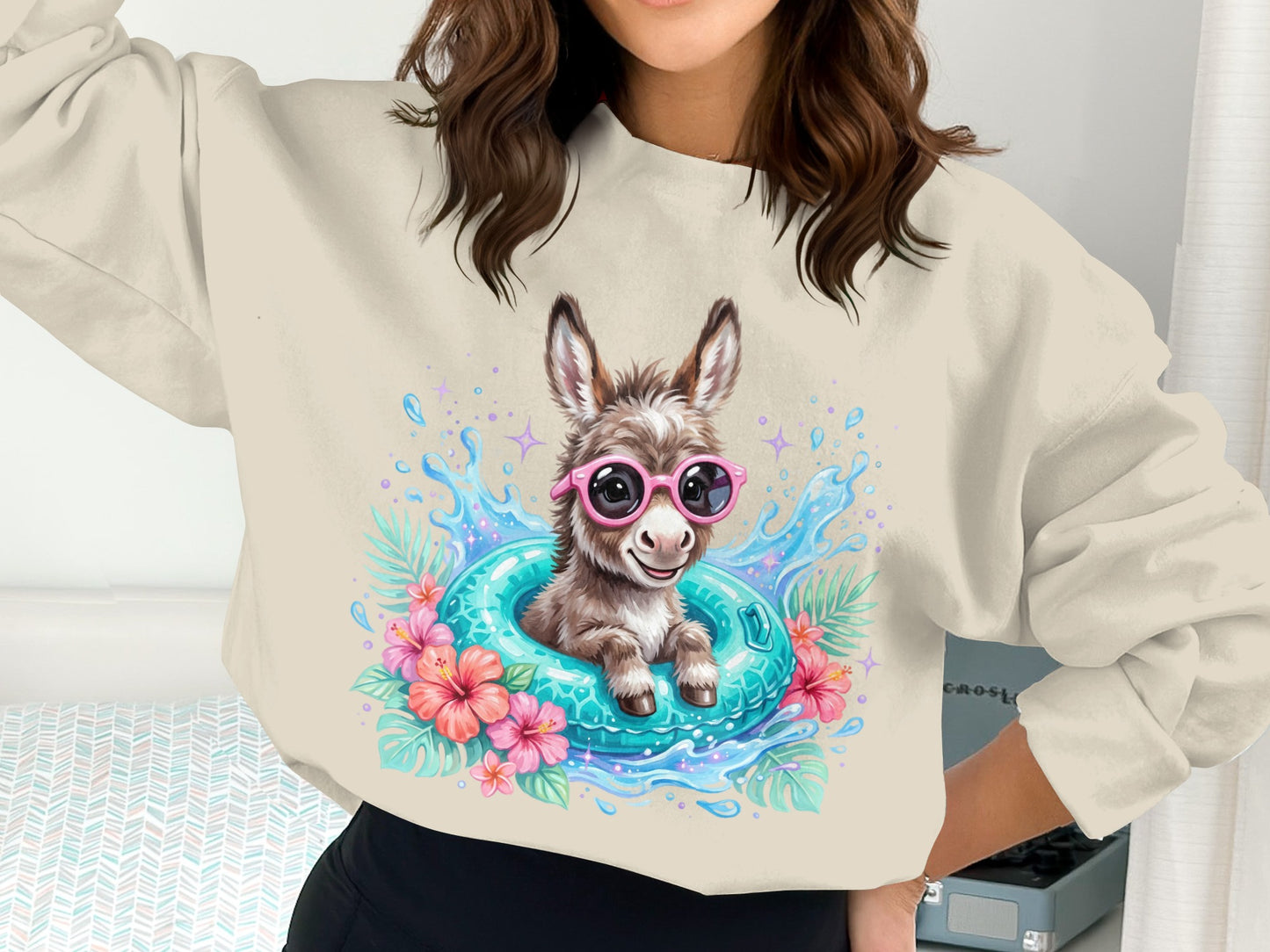 Donkey wearing pink sunglasses in a pool float with flowers.