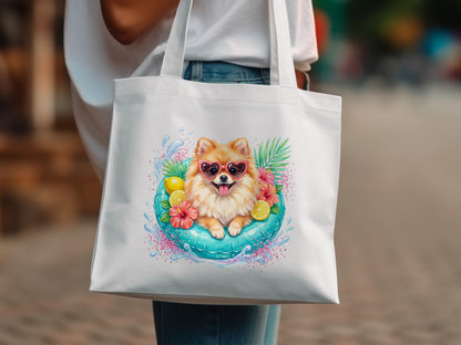 White tote bag with a cartoon Pomeranian dog wearing heart sunglasses in a pool float.