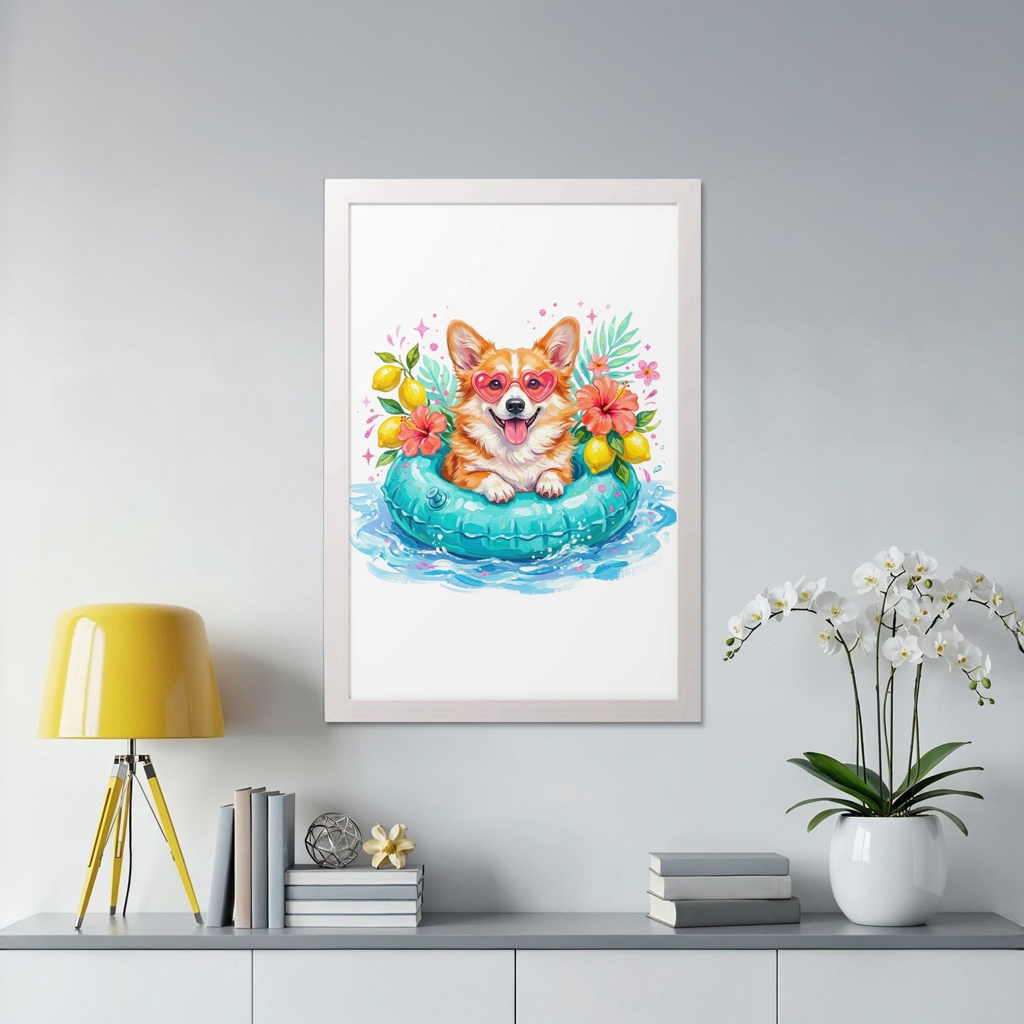 Corgi wearing sunglasses floats on a blue inner tube with lemons and flowers.