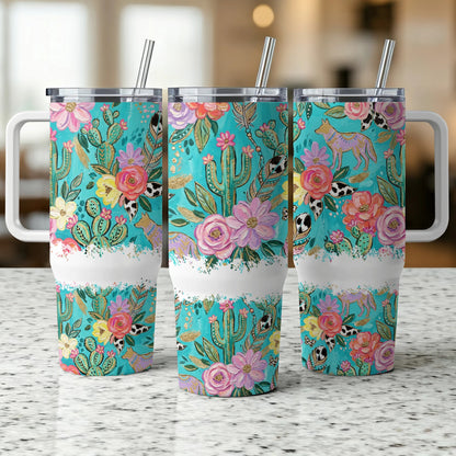 Three tumblers with desert floral and animal pattern on a speckled counter.