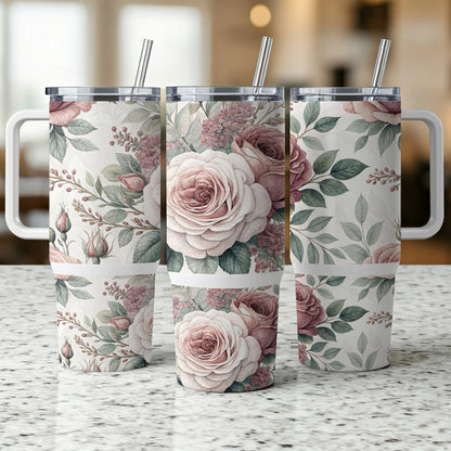 Three tumblers with a floral pattern of pink roses and green leaves.