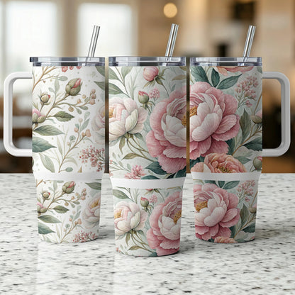 Three floral tumblers with pink and white peonies and greenery.