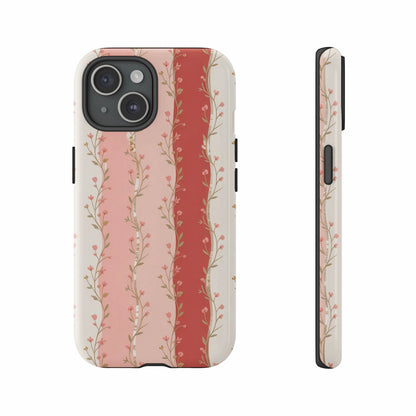 Phone case with pink and white vertical stripes and floral pattern.