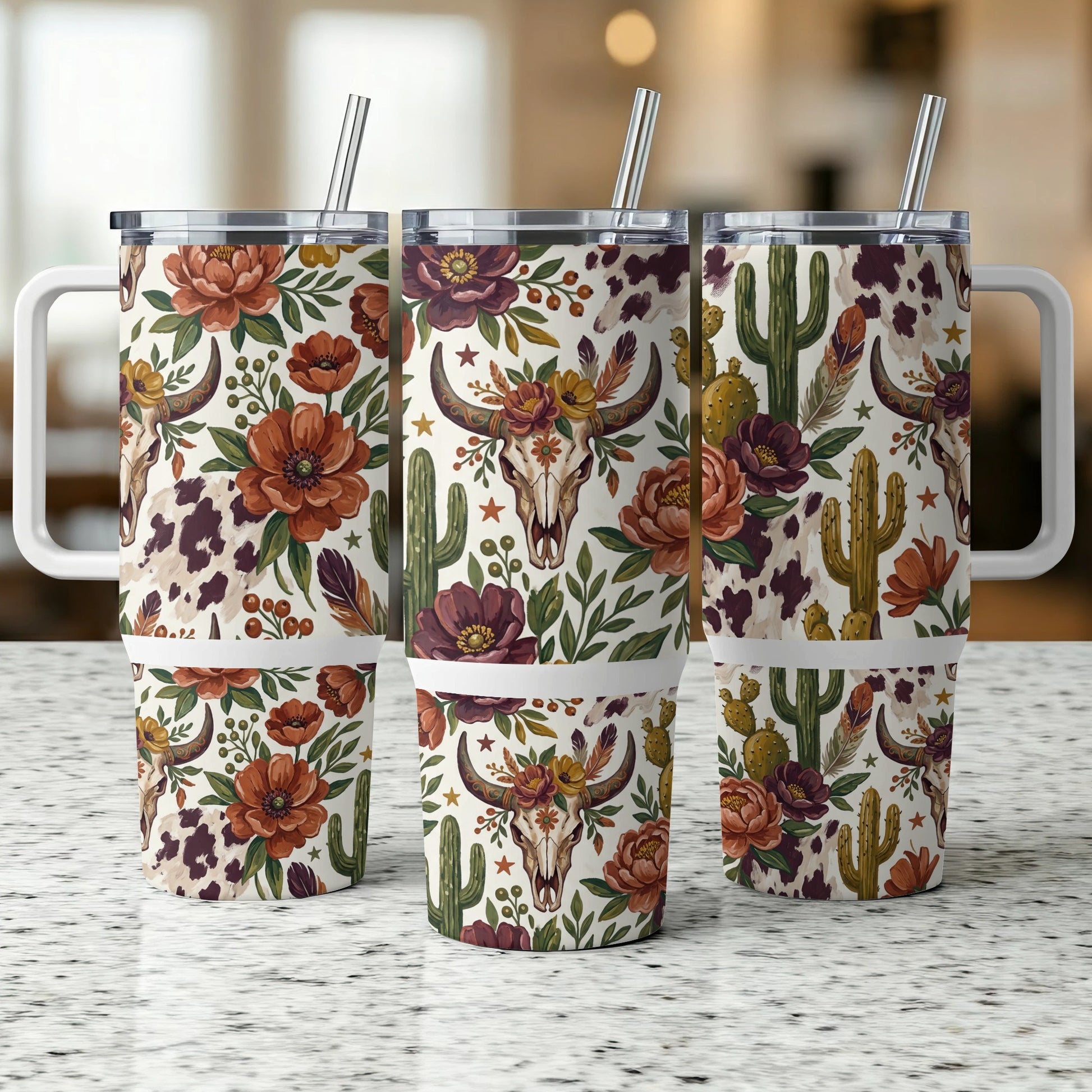 Three tumblers with floral, skull, and cactus pattern.