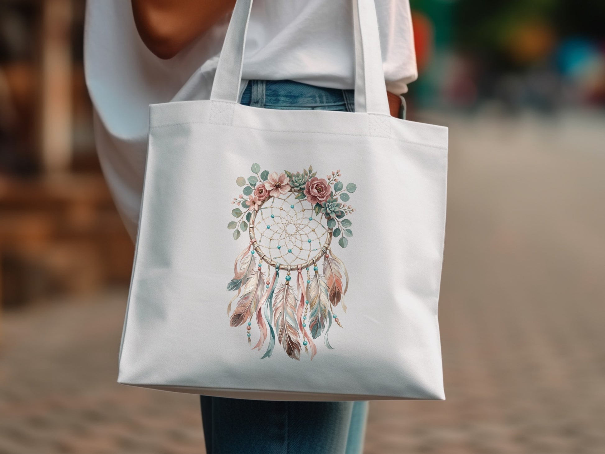 White tote bag with watercolor dreamcatcher and floral design.