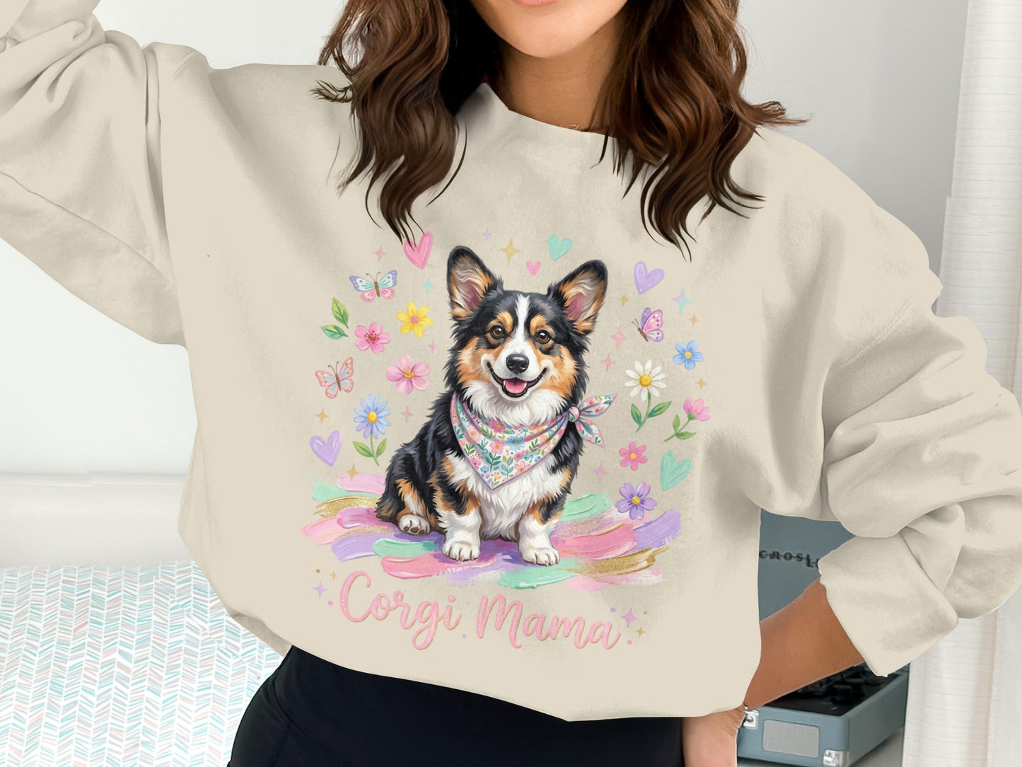 Corgi Mama sweatshirt with a happy Corgi wearing a bandana surrounded by flowers.