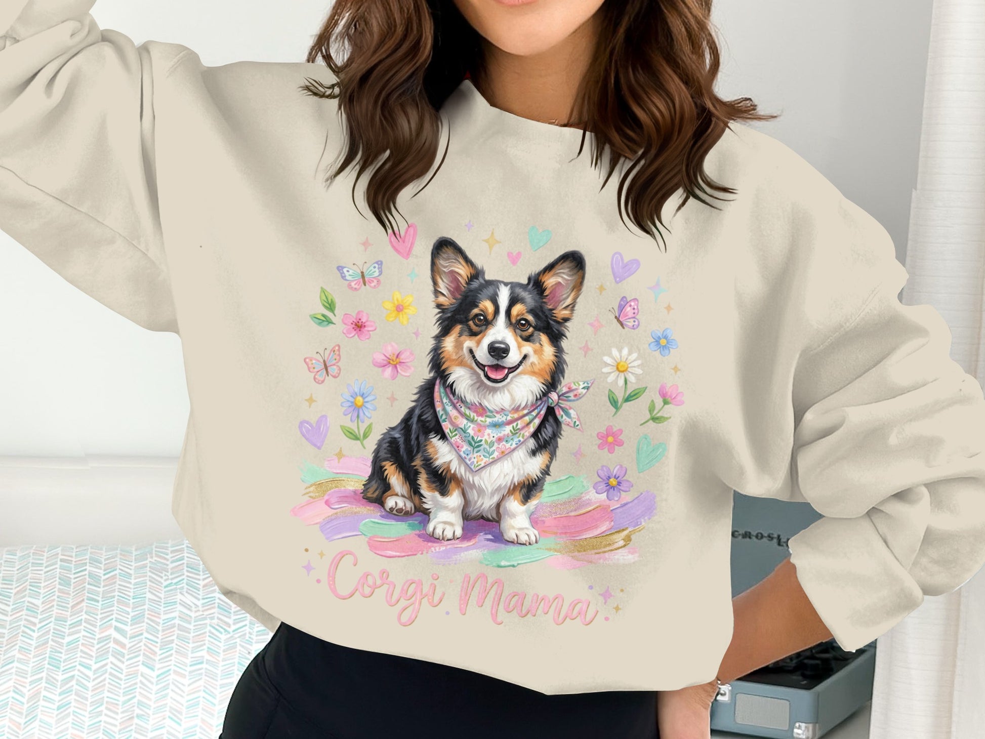 Corgi Mama sweatshirt with a happy Corgi wearing a bandana surrounded by flowers.