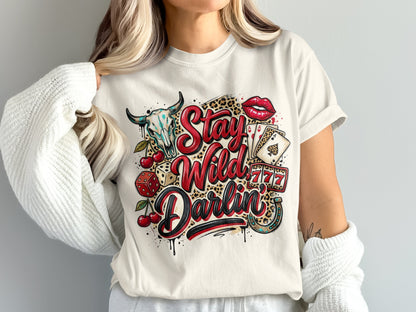 T-shirt with bull skull, cherries, dice, cards, lipstick, and text "Stay Wild Darlin'".