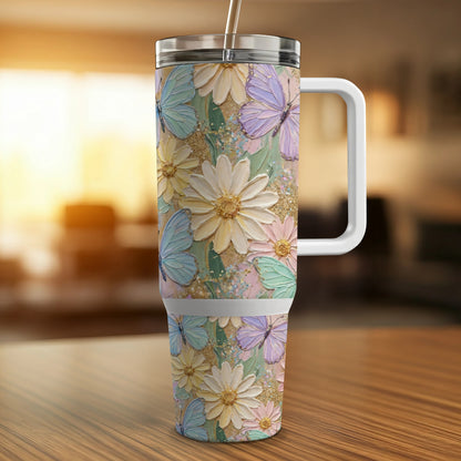 White tumbler with colorful floral and butterfly pattern.