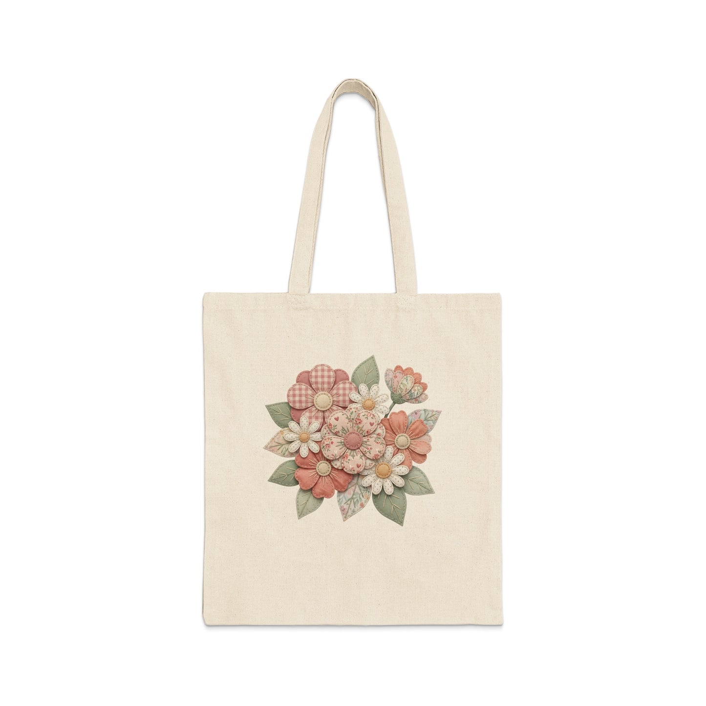 Canvas tote bag with a floral pattern in muted pinks and greens.