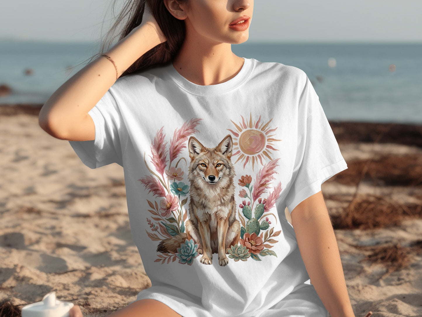 White t-shirt with a coyote and desert floral graphic print.