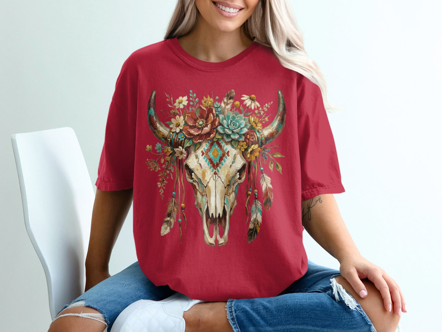 Red t-shirt with skull floral headdress design.