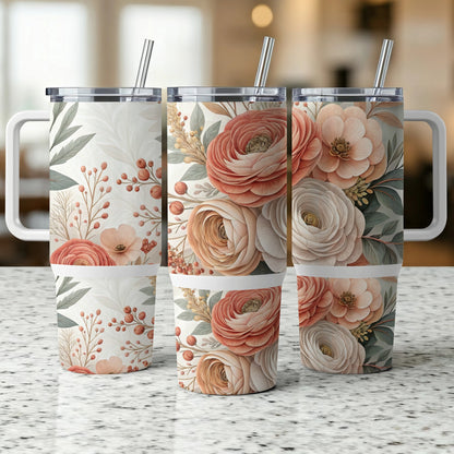 Three insulated tumblers with floral patterns and metal straws.