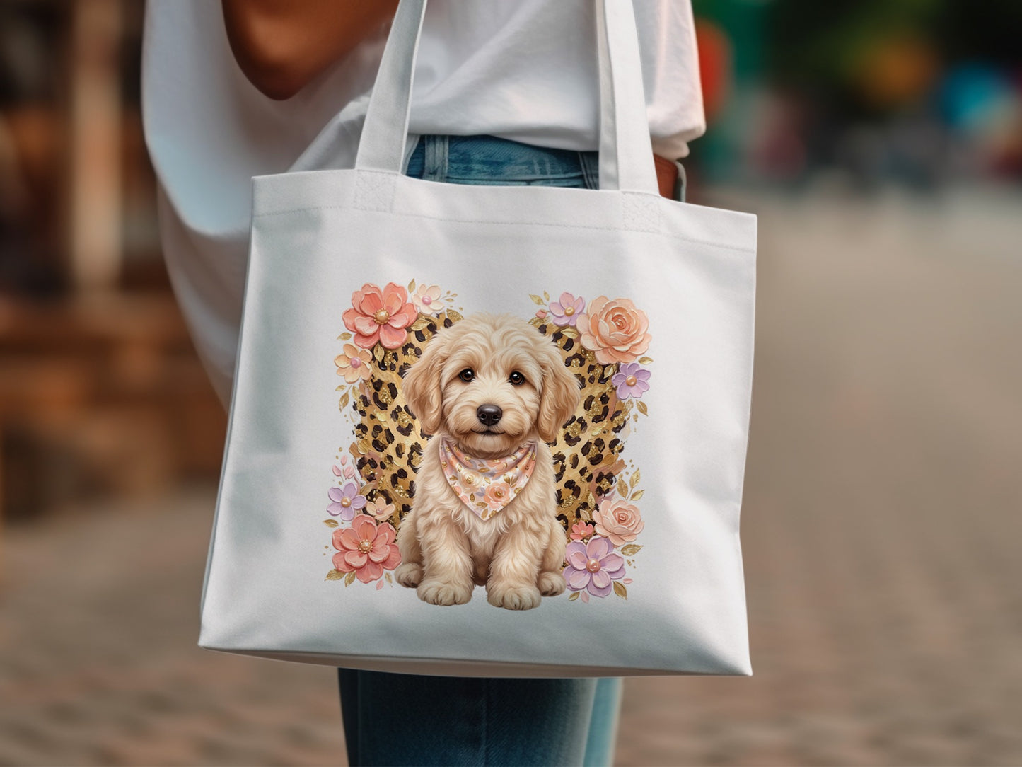 White tote bag with a cute doodle dog wearing a bandana and floral accents.