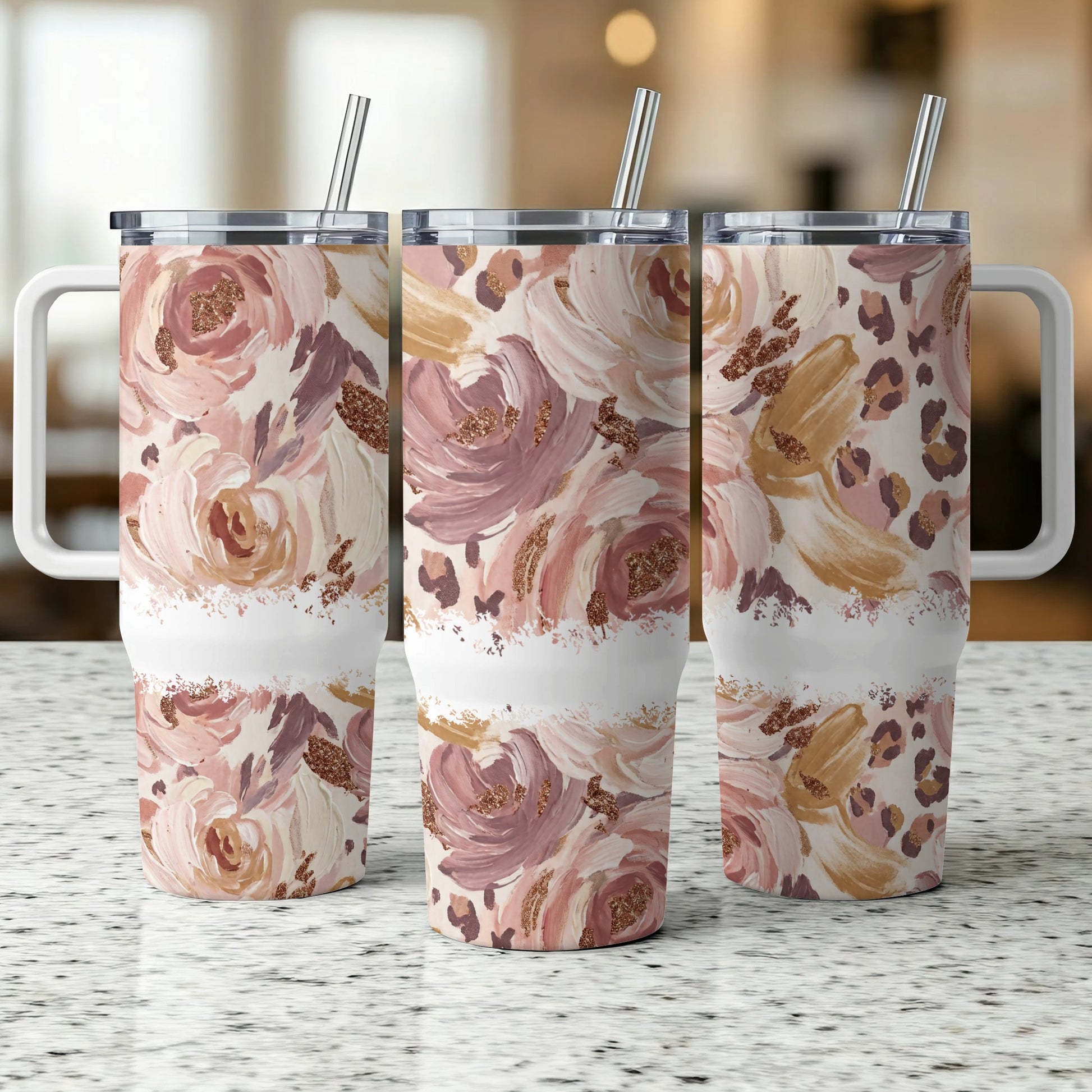 Three tumblers with floral and leopard print designs.