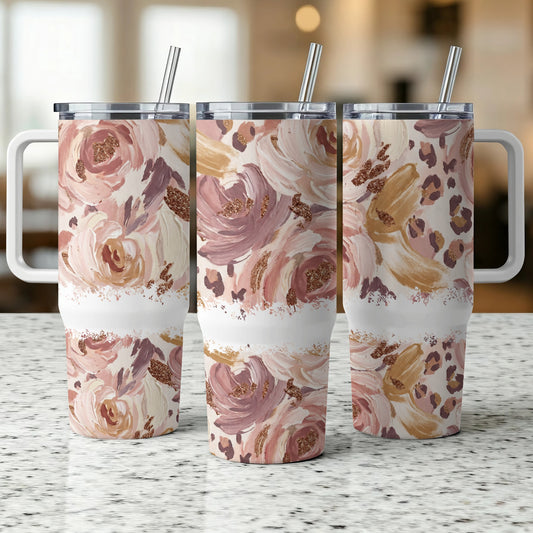 Three tumblers with floral and leopard print designs.