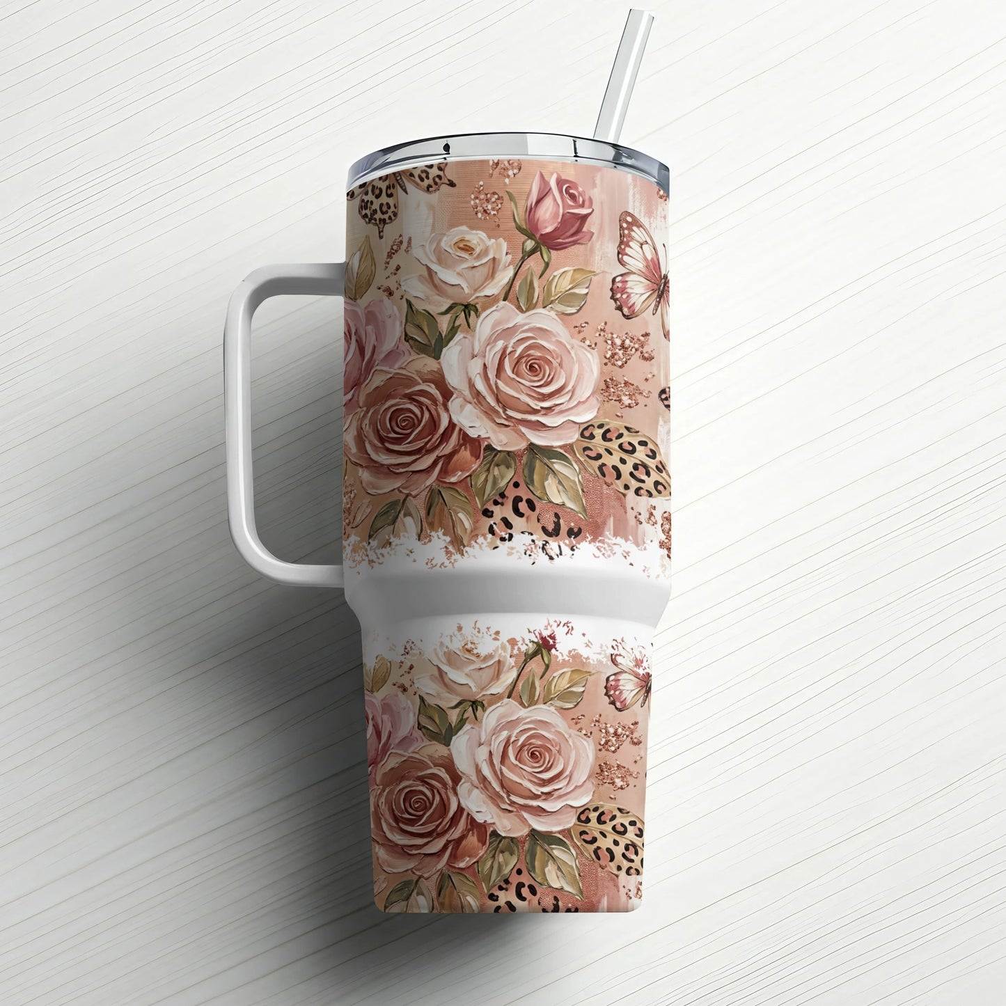 Tumbler with floral and leopard print design.