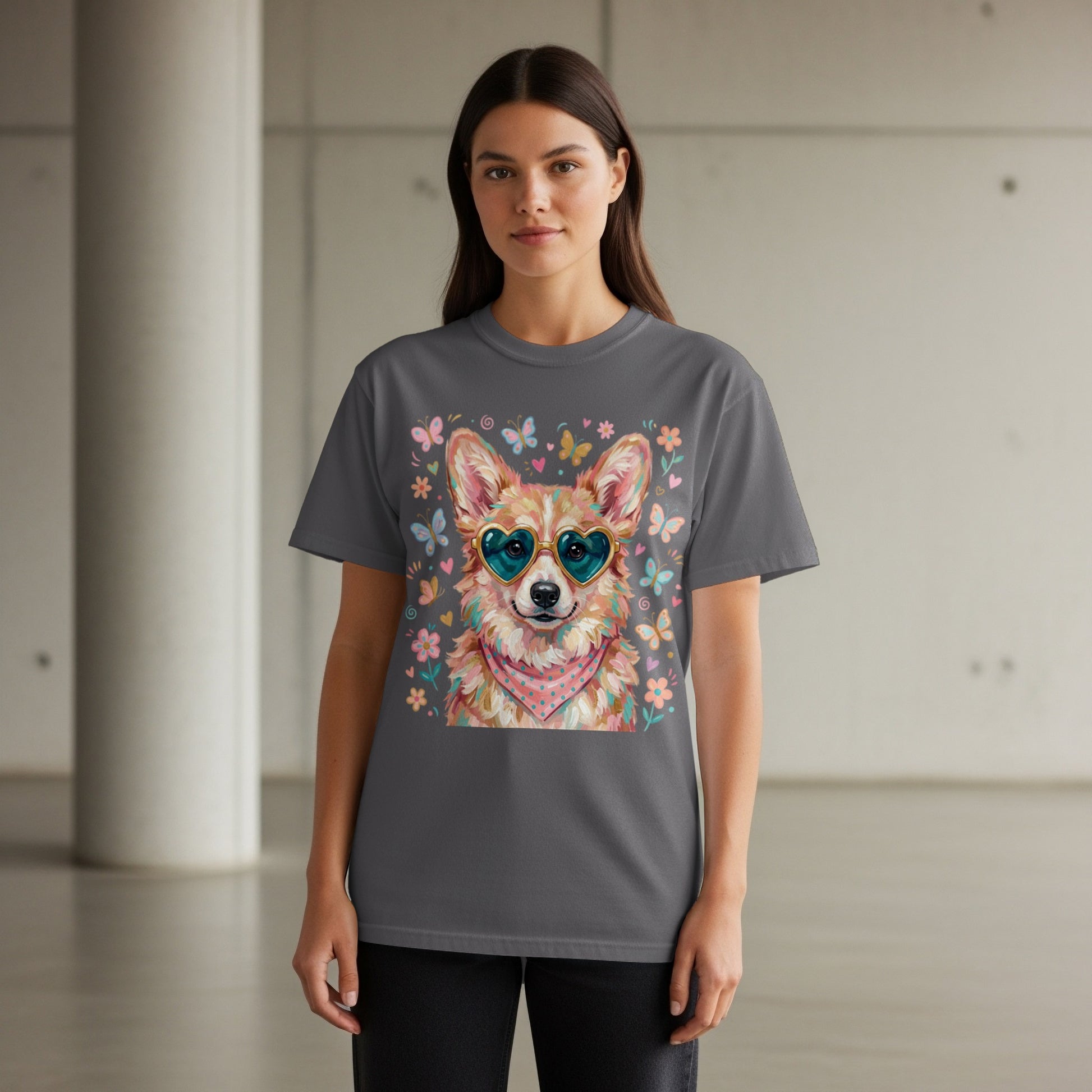 Corgi wearing heart sunglasses and bandana with butterflies on dark gray t-shirt.