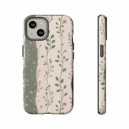 Two phone cases with a delicate floral vine pattern on a white background.