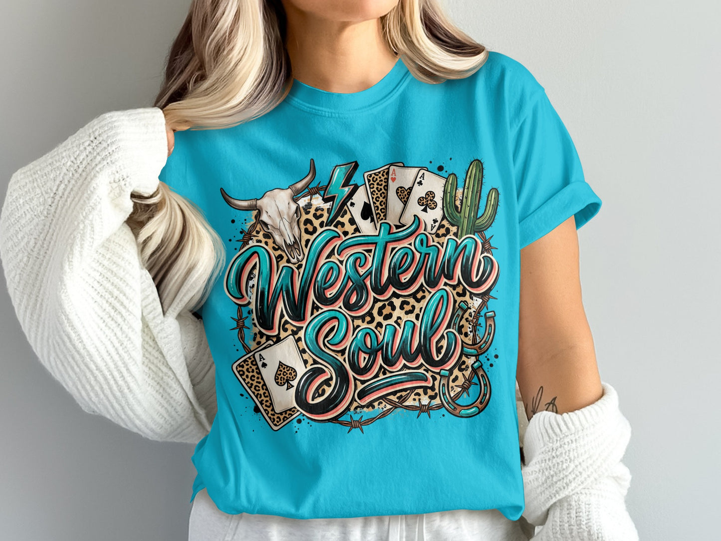 Turquoise t-shirt with "Western Soul" text, skull, cards, and cactus.