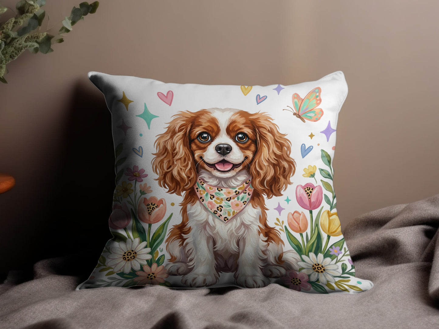 Cavalier King Charles Spaniel wearing a bandana, surrounded by flowers and hearts.