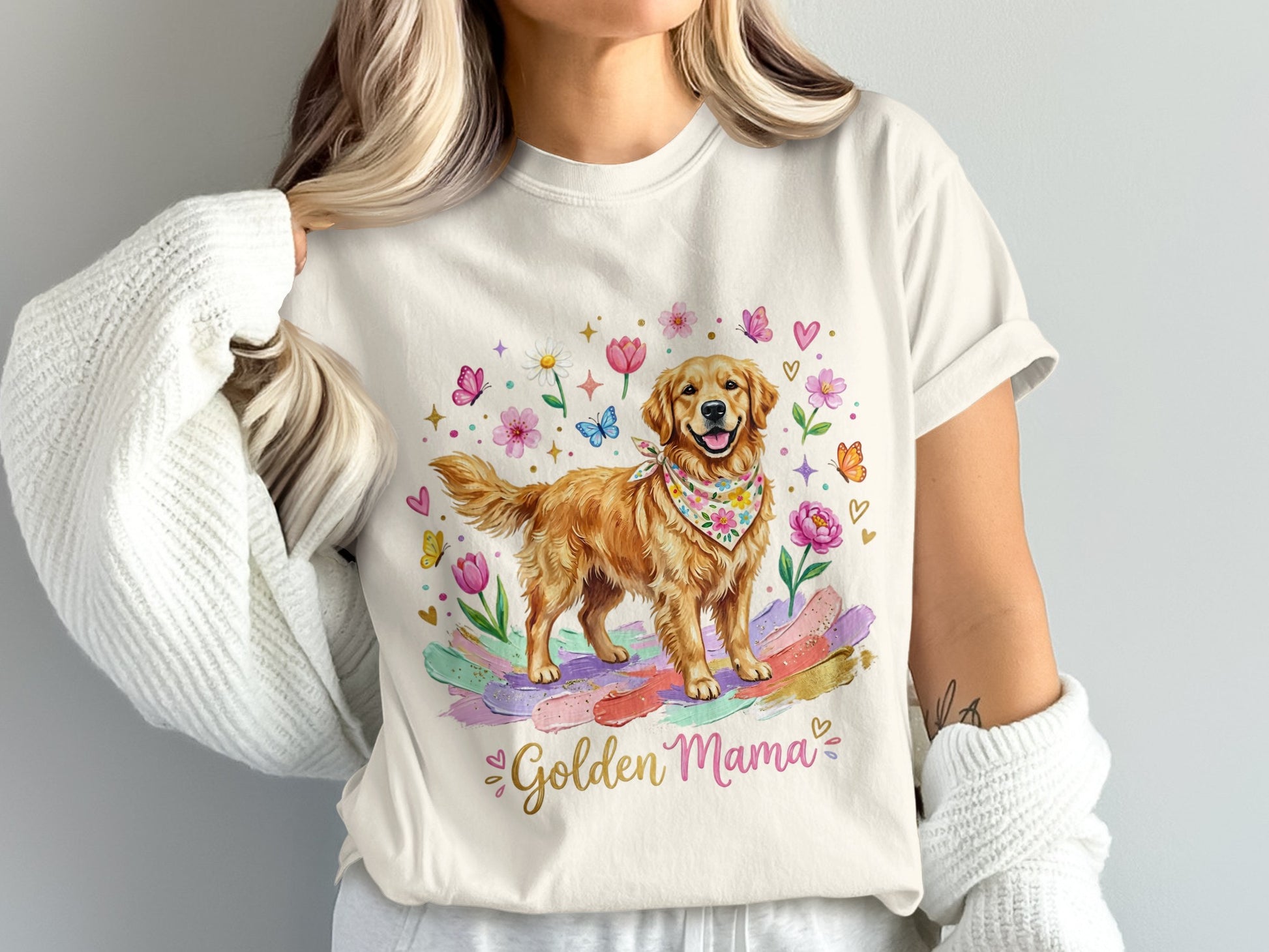 Golden Retriever wearing bandana, surrounded by flowers and butterflies, with "Golden Mama" text.