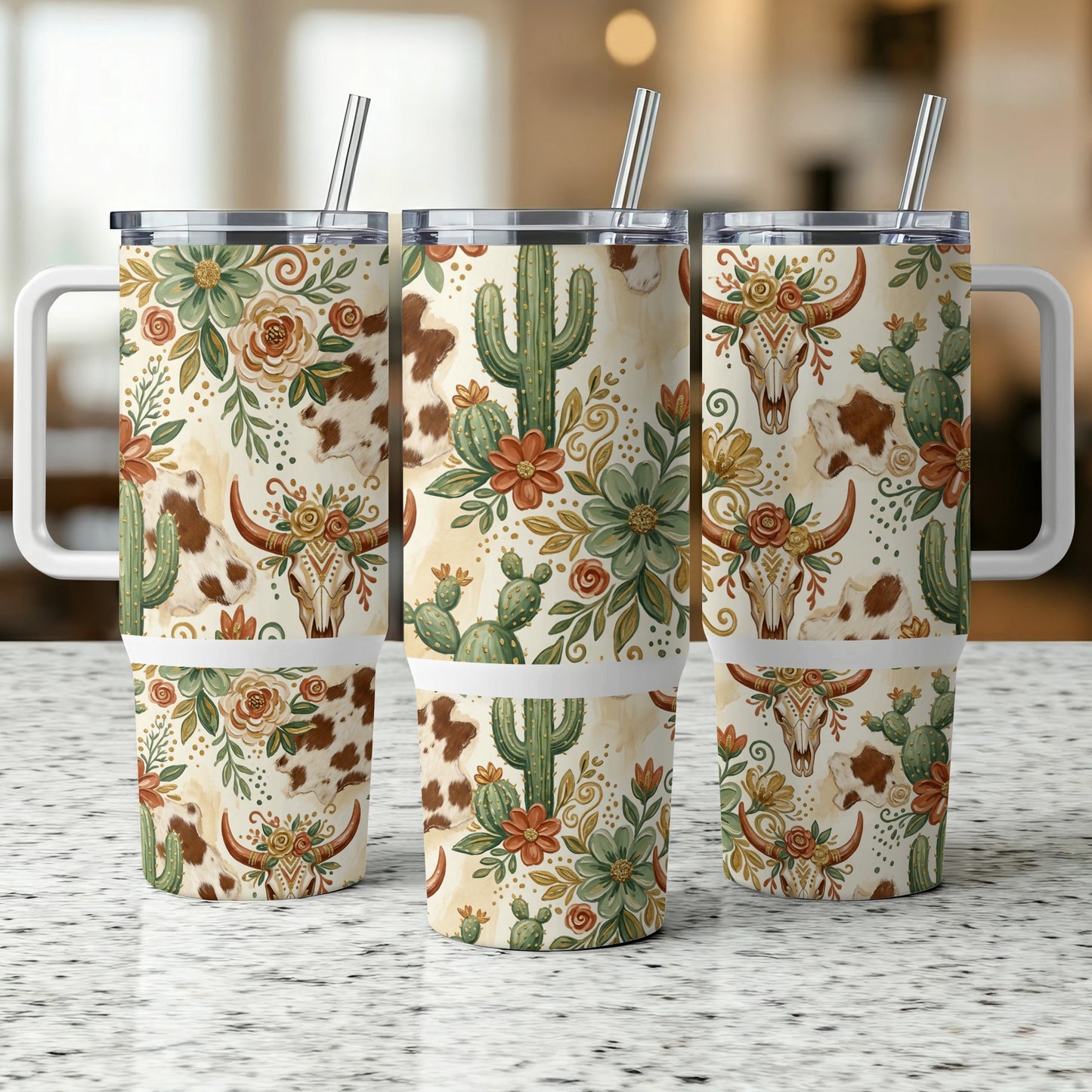 Three tumblers with a cactus and cattle skull desert floral pattern.
