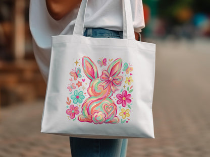 White tote bag with colorful Easter bunny and floral design.