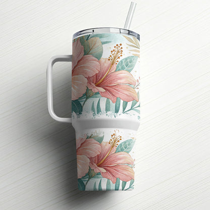 Floral tumbler with handle and straw, featuring pink hibiscus flowers and green leaves.