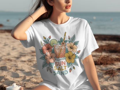 White t-shirt with colorful floral design and "Sun Salt Sand" text.