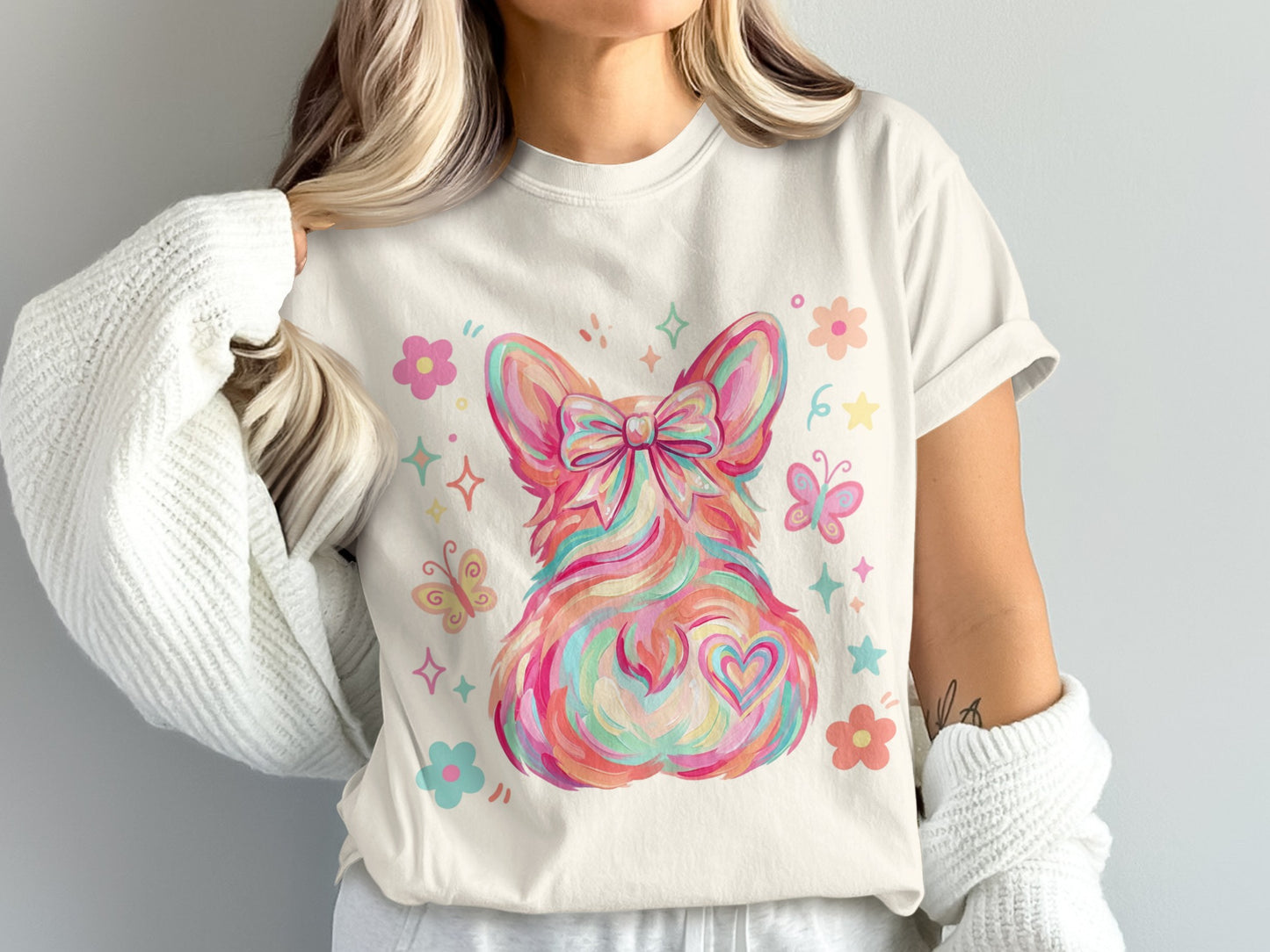 Watercolor corgi with bow and heart, surrounded by flowers and butterflies.
