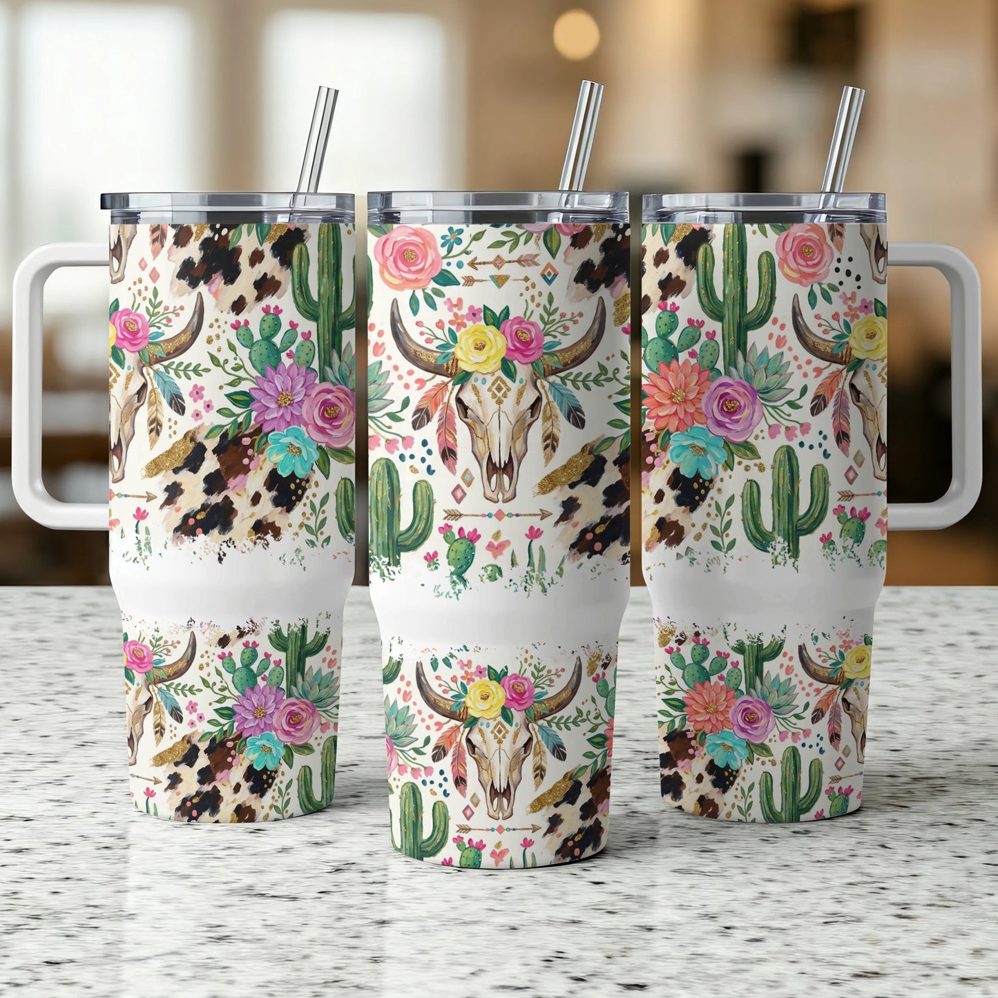 Three tumblers with a cow skull and floral western design.