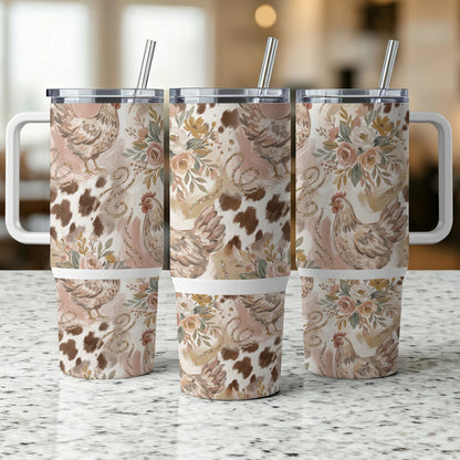 Three patterned tumblers with chicken and floral designs and straw handles.