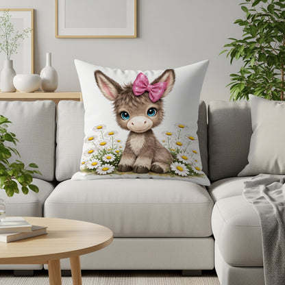 Cartoon donkey with pink bow on cushion with daisies.