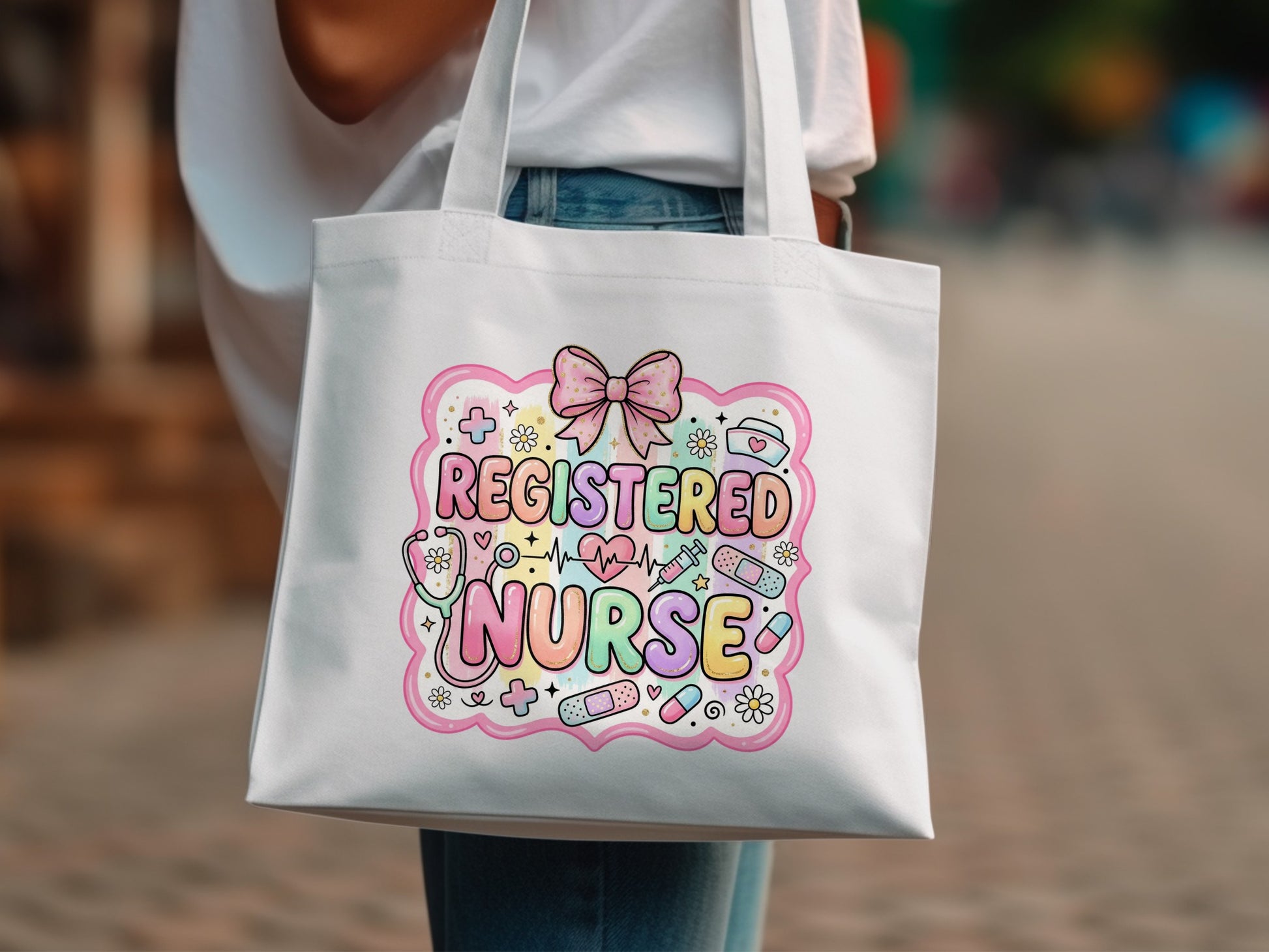 White tote bag with "Registered Nurse" text and colorful medical icons.
