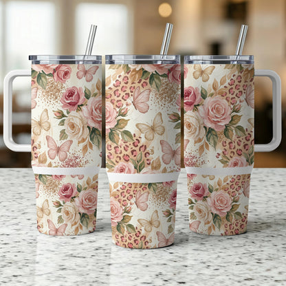 Three tumblers with floral and leopard print patterns and butterfly accents.
