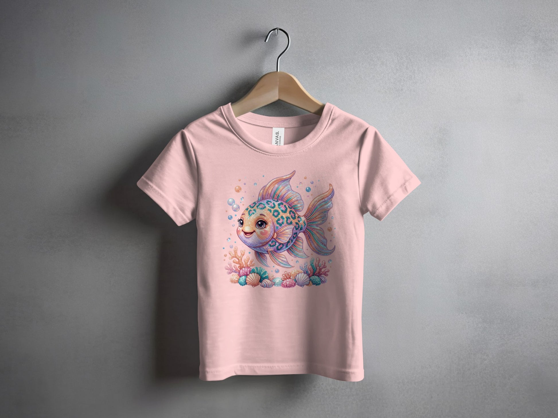 Pink t-shirt featuring a cartoon goldfish with colorful scales and bubbles.