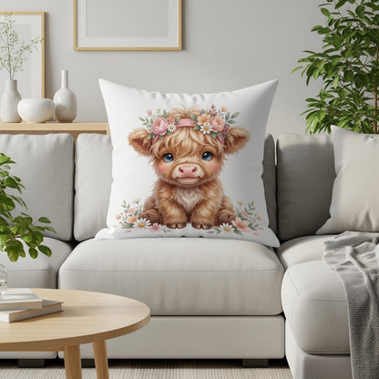 Fluffy baby cow with flower crown on sofa cushion.