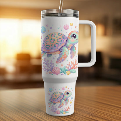 White tumbler with cartoon sea turtles, coral, and bubbles.