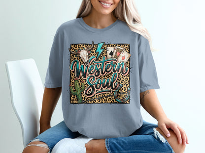 T-shirt with leopard print, cow skull, cactus, playing cards, and horseshoe.