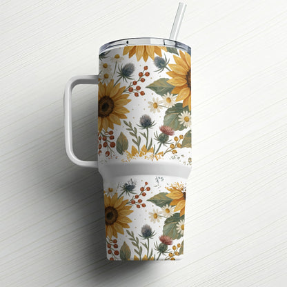 Large tumbler with sunflowers, daisies, and berries pattern, white handle, straw.