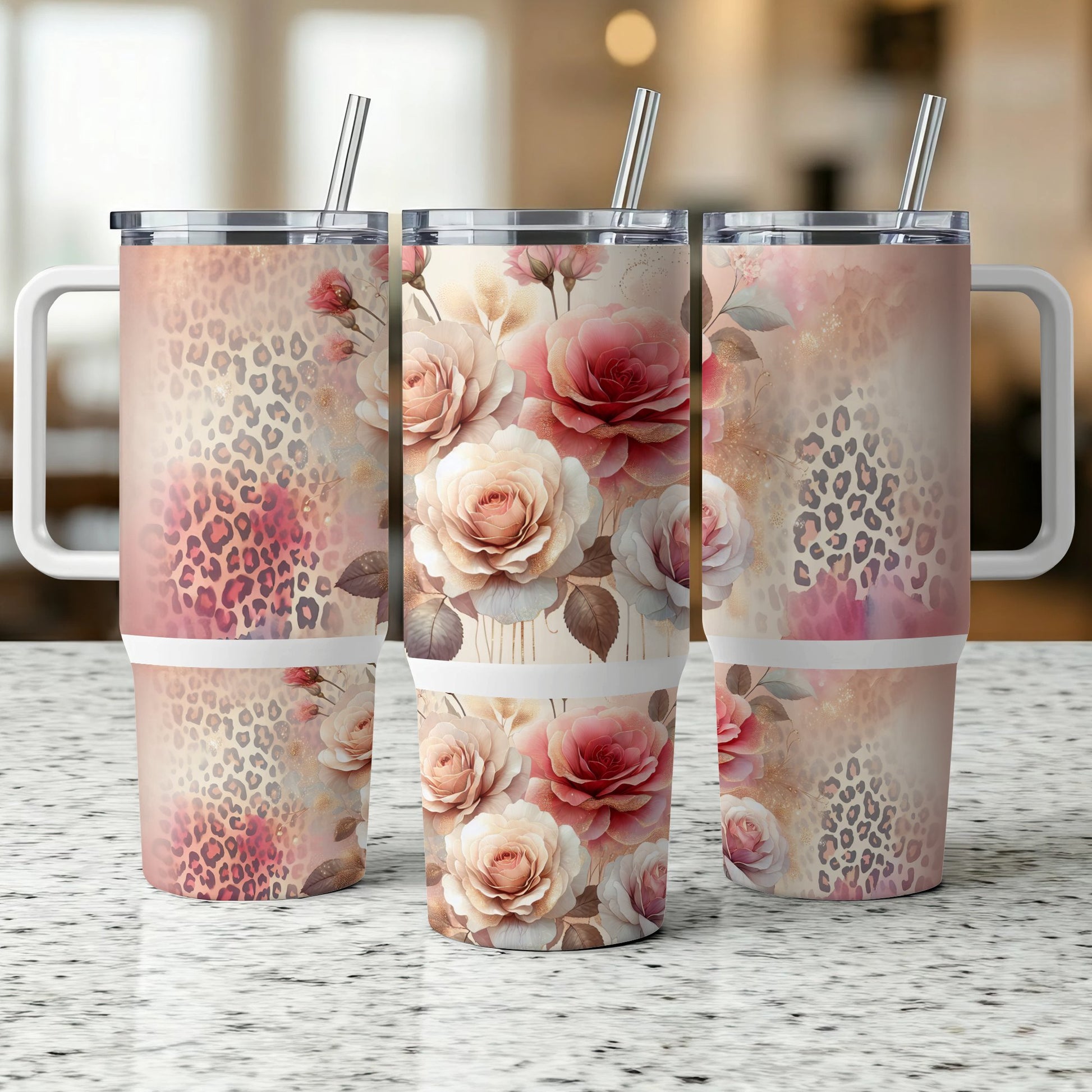 Three tumblers with floral and leopard print designs, one in front.