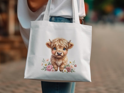 Tote bag with a cute fluffy calf illustration surrounded by flowers.