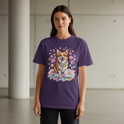 Woman wearing a purple t-shirt with a corgi wearing a bandana and flowers.