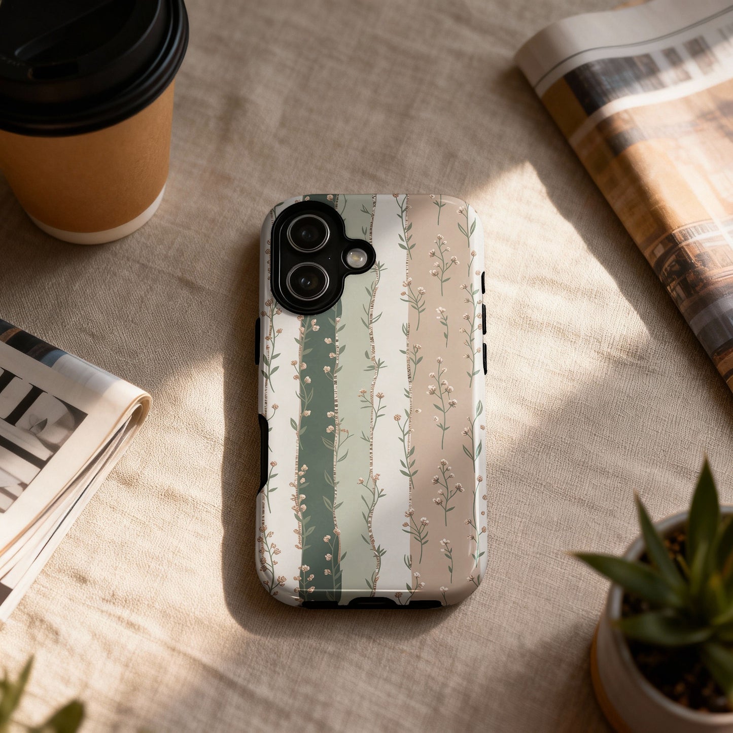 Phone case with a floral stripe pattern in green and beige.