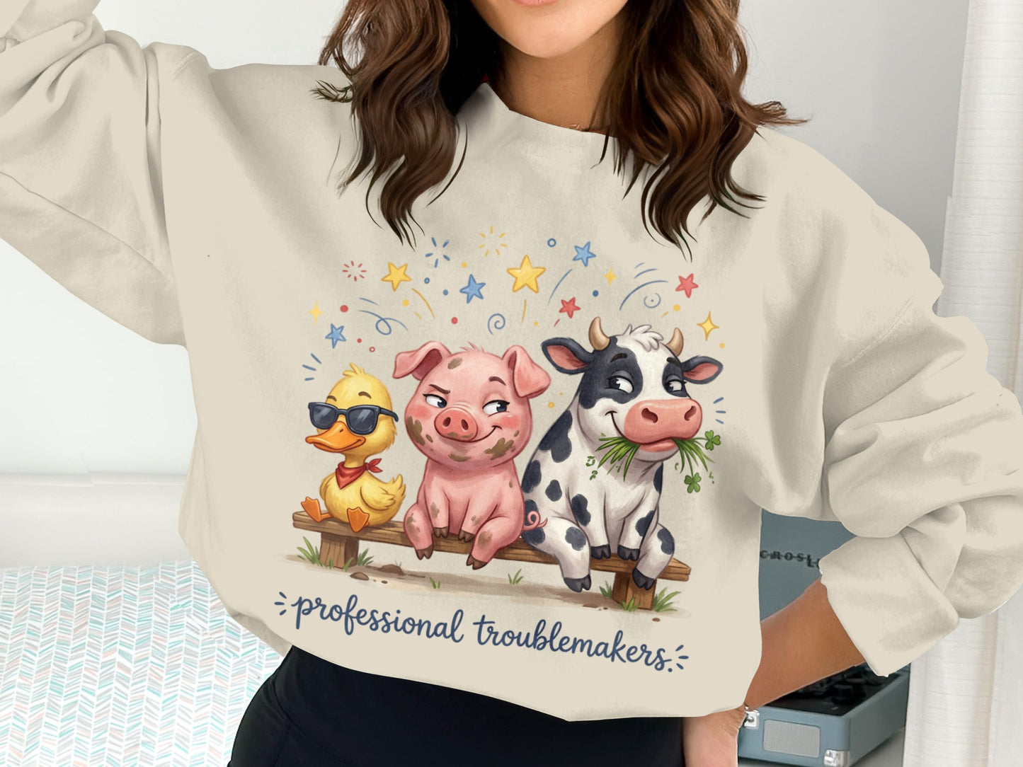 Pig, cow, and duck wearing sunglasses on a bench, with text "professional troublemakers".