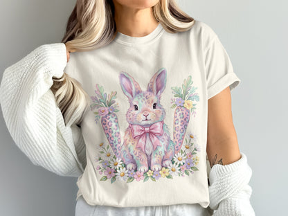 Cream t-shirt with a pastel watercolor bunny, carrots, and flowers design.