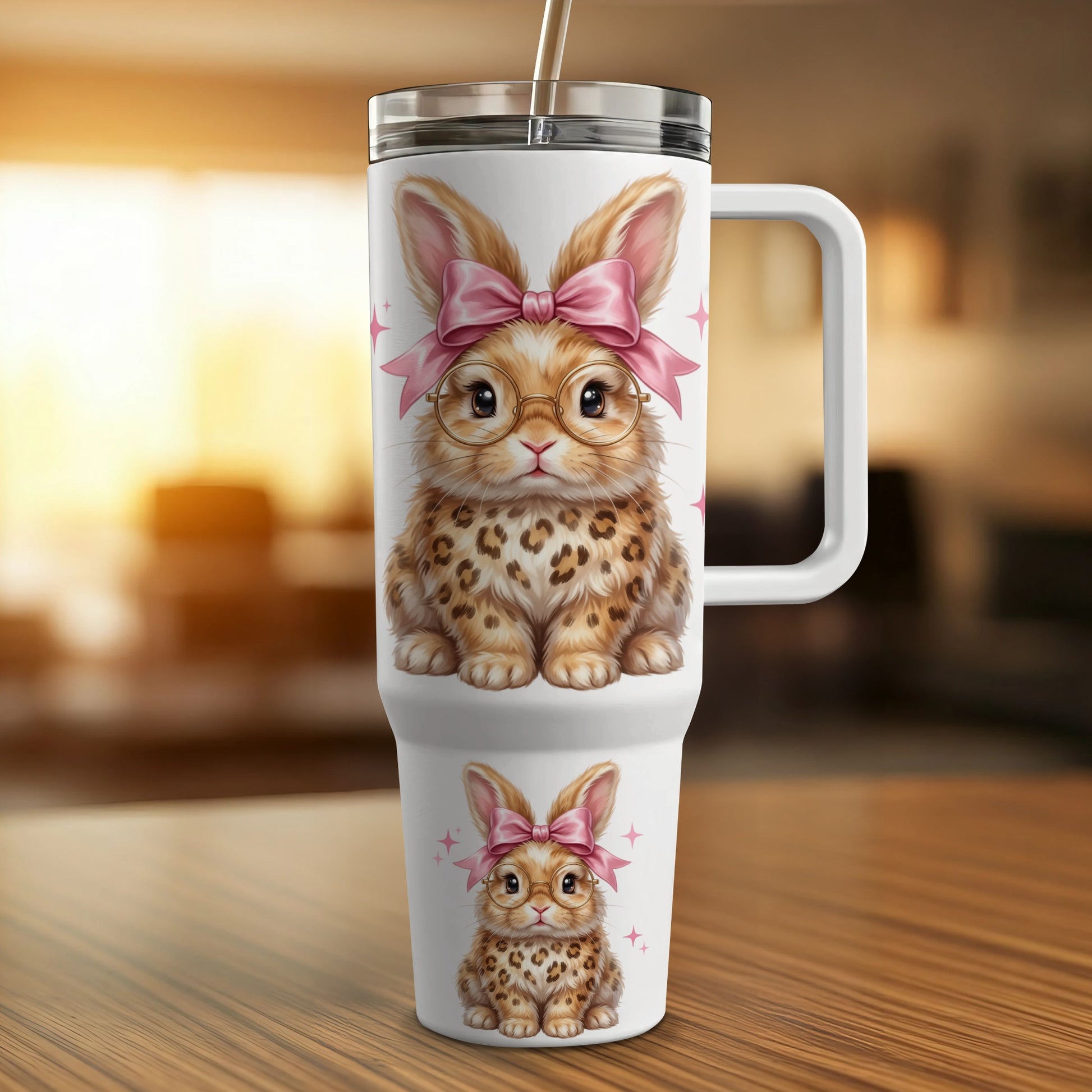 White tumbler with leopard print bunny wearing glasses and pink bow.