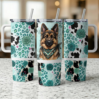 German Shepherd wearing bandana on teal leopard and rose print tumbler.